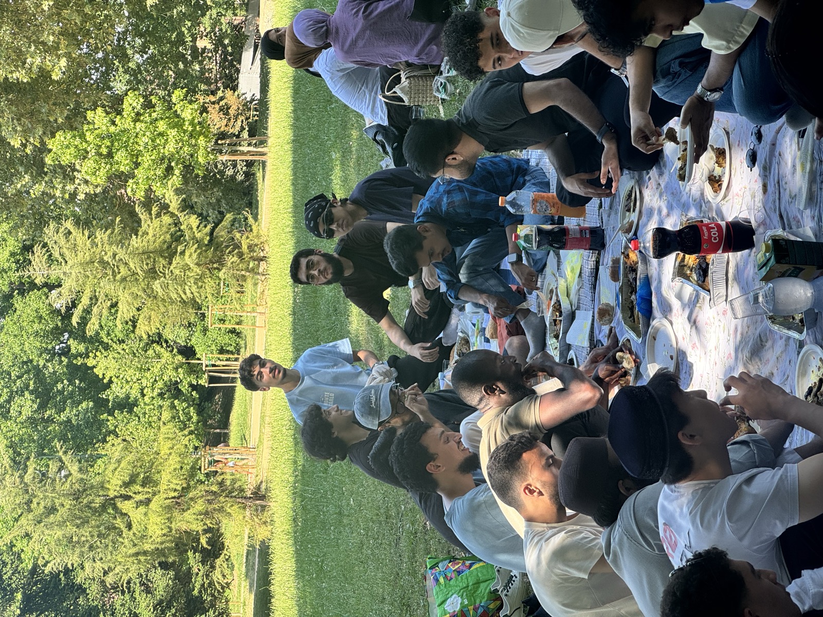 Students sharing traditional Eid sweets and tea