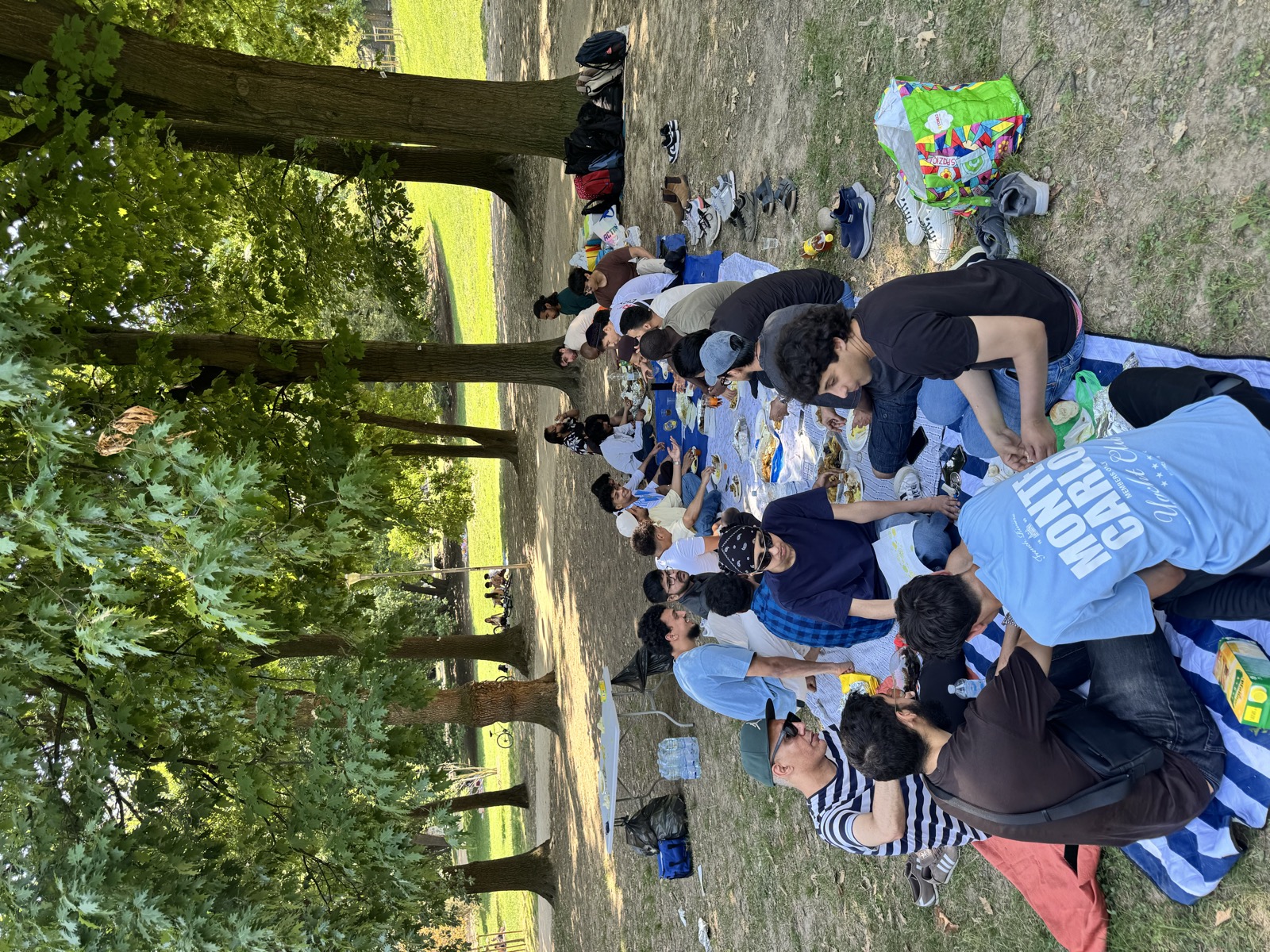 Community gathering and group discussions under the trees