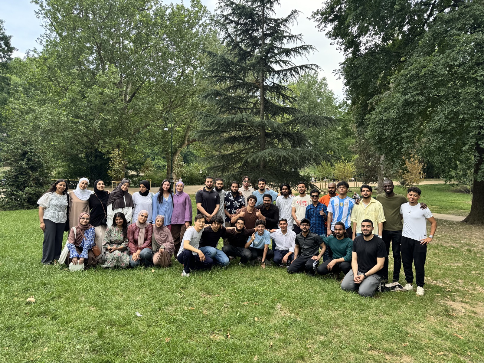 Students by the lake at the ASM Eid outing